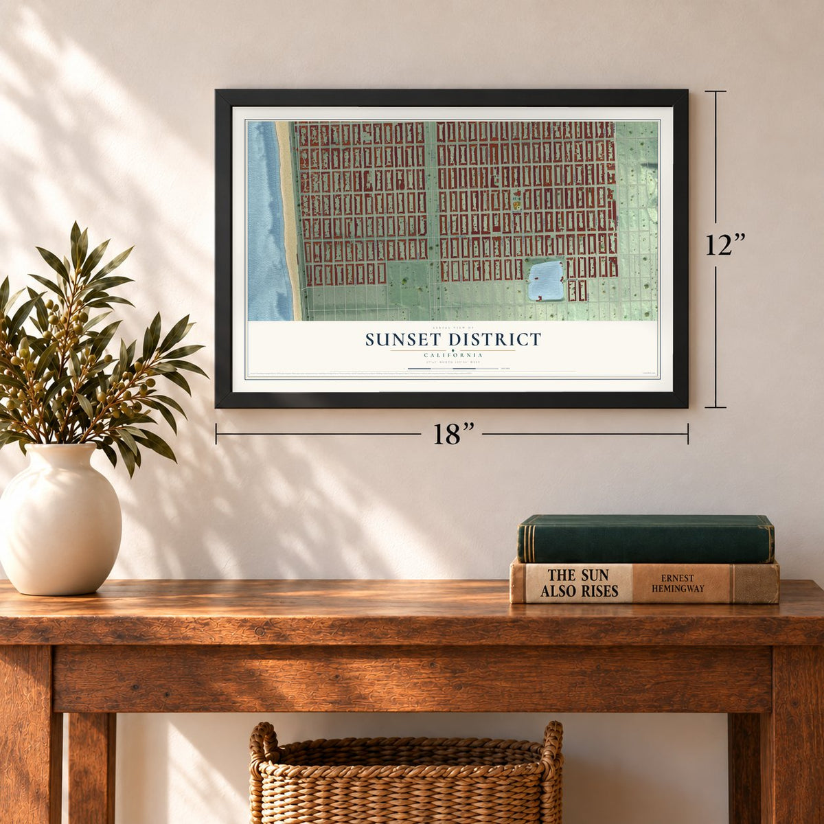 Sunset District, California map, 12 x 18 inch print in a black frame in an entryway