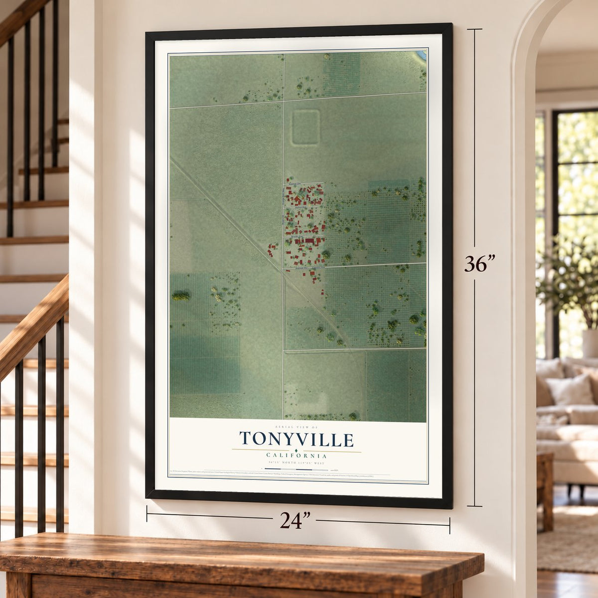 Tonyville, California map, 24 x 36 inch print in a black frame by a staircase