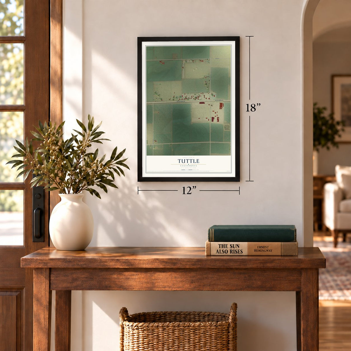 Tuttle, California map, 12 x 18 inch print in a black frame in an entryway
