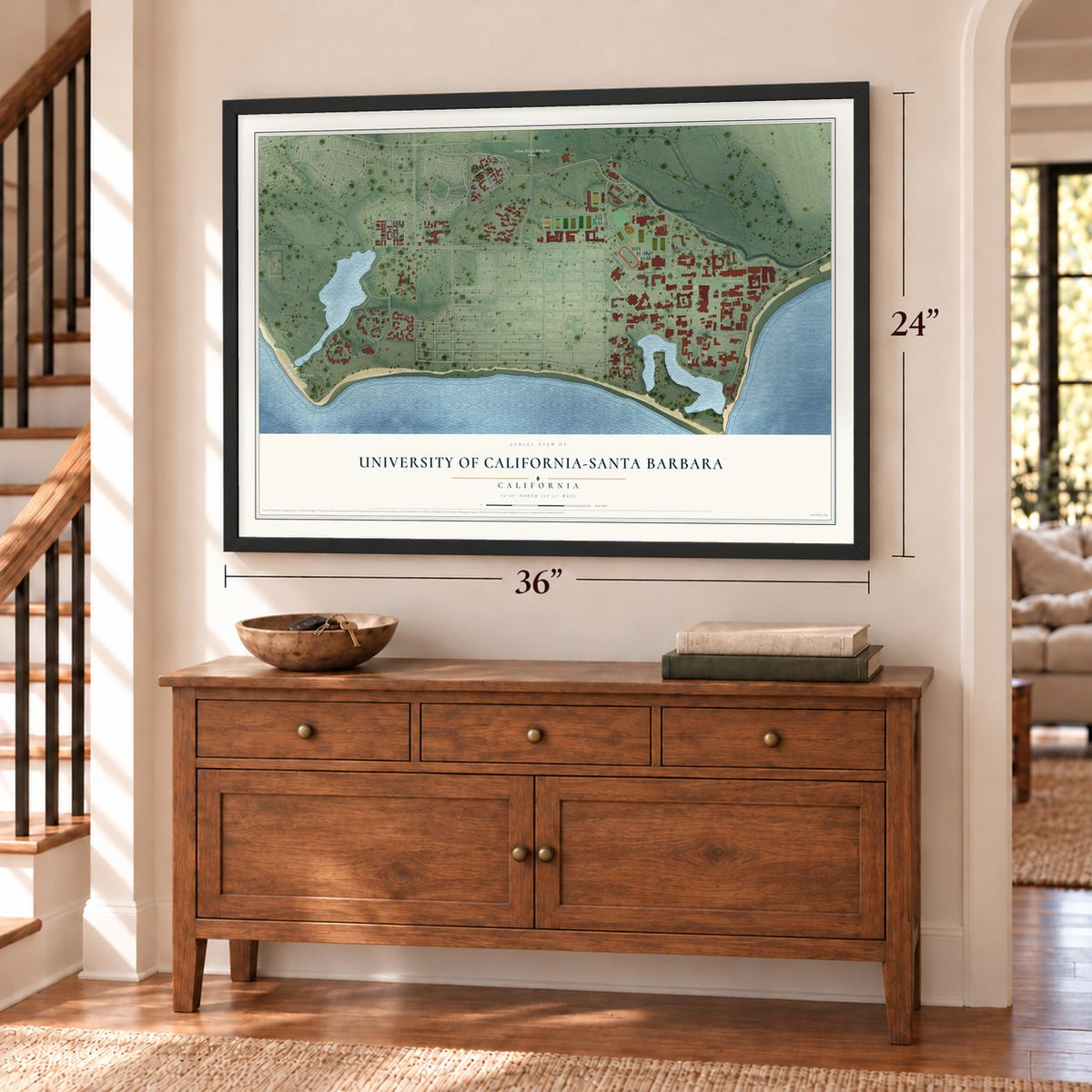 University of California-Santa Barbara, California map, 24 x 36 inch print in a black frame above a dresser by a staircase