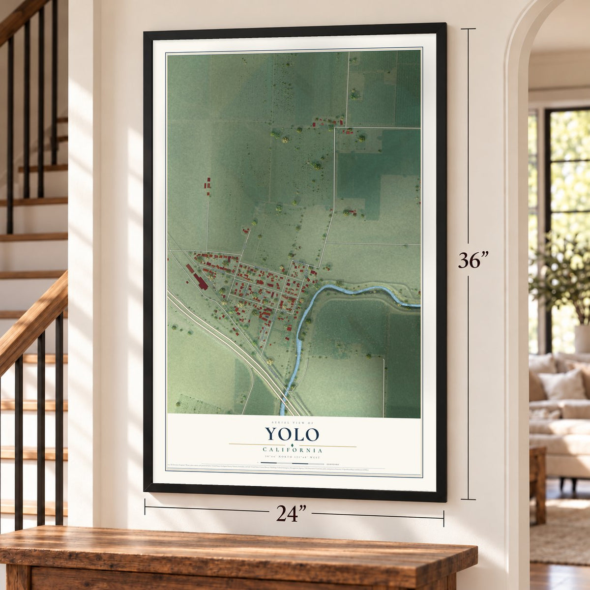 Yolo, California map, 24 x 36 inch print in a black frame by a staircase