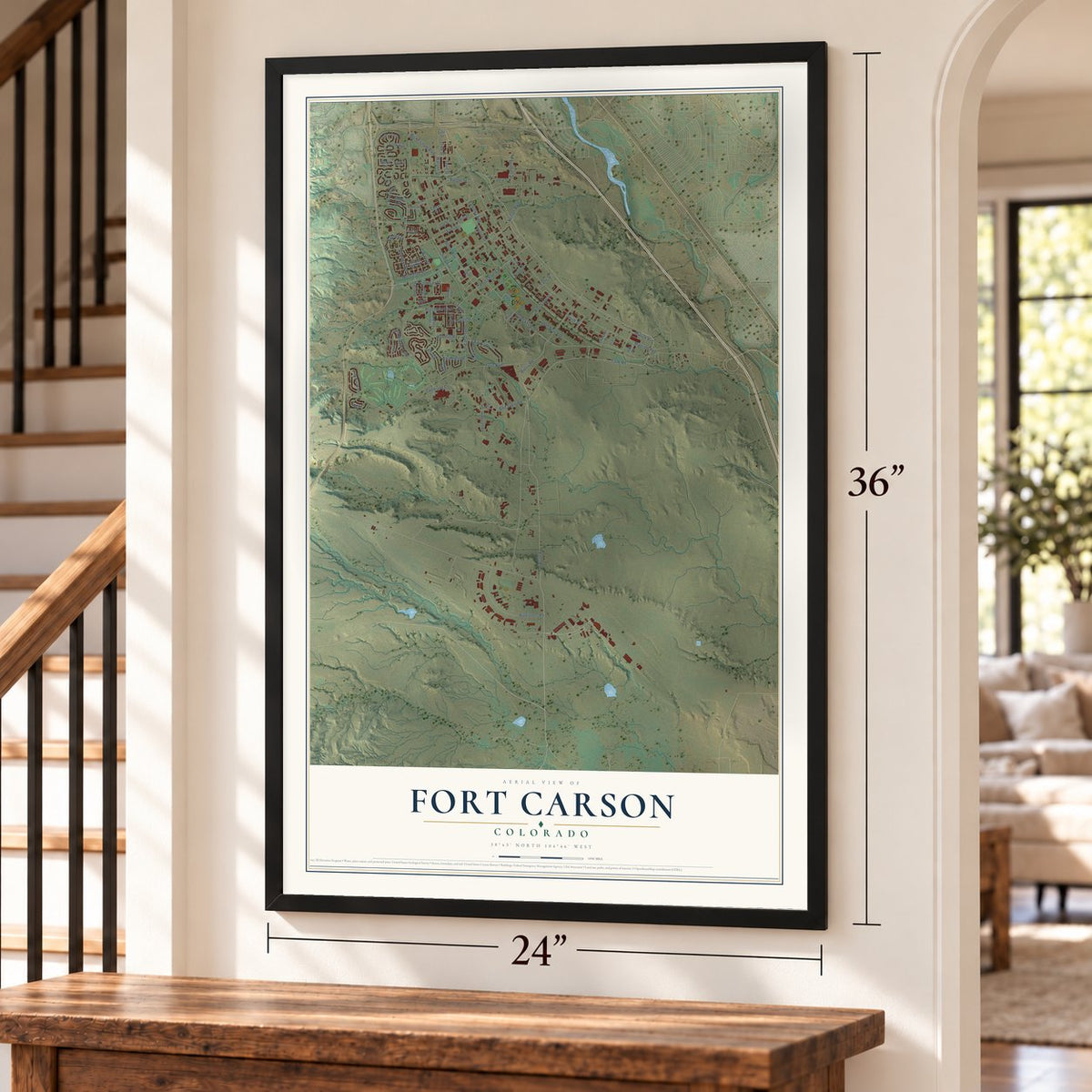 Fort Carson, Colorado map, 24 x 36 inch print in a black frame by a staircase