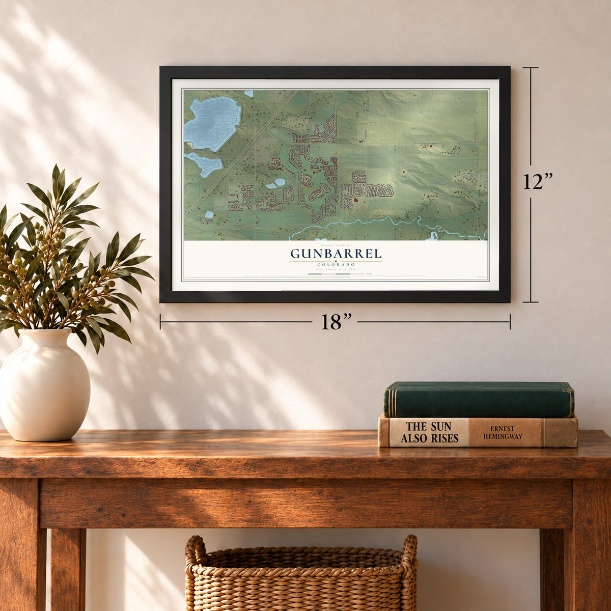Gunbarrel, Colorado map, 12 x 18 inch print in a black frame in an entryway