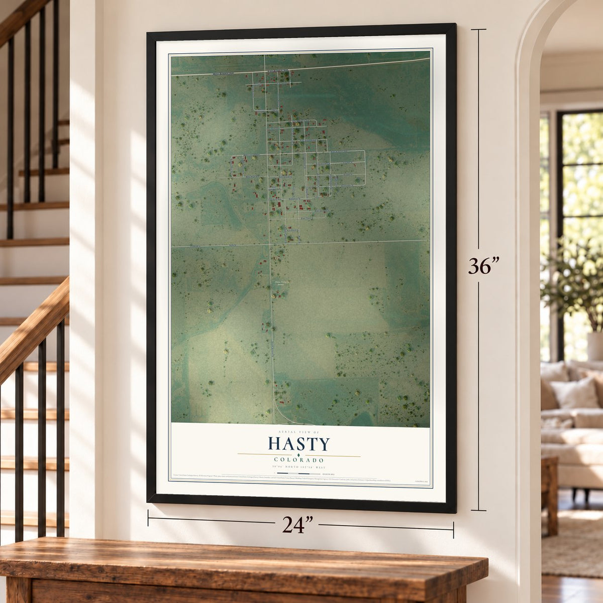 Hasty, Colorado map, 24 x 36 inch print in a black frame by a staircase