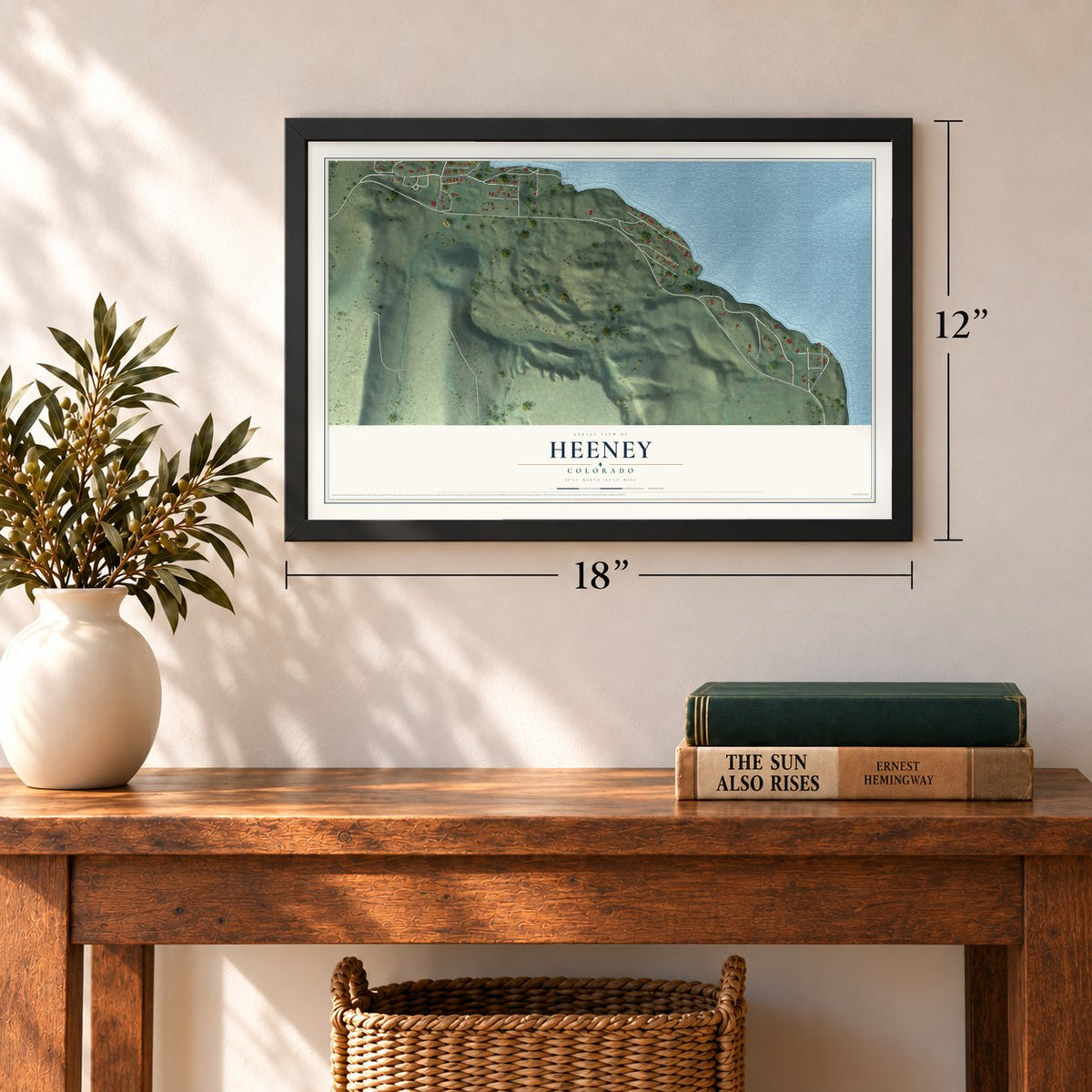 Heeney, Colorado map, 12 x 18 inch print in a black frame in an entryway