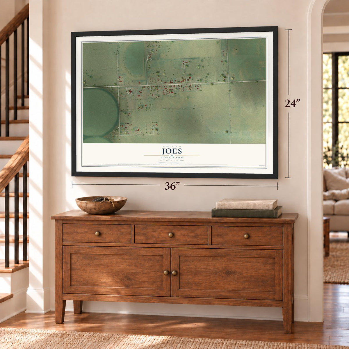 Joes, Colorado map, 24 x 36 inch print in a black frame above a dresser by a staircase