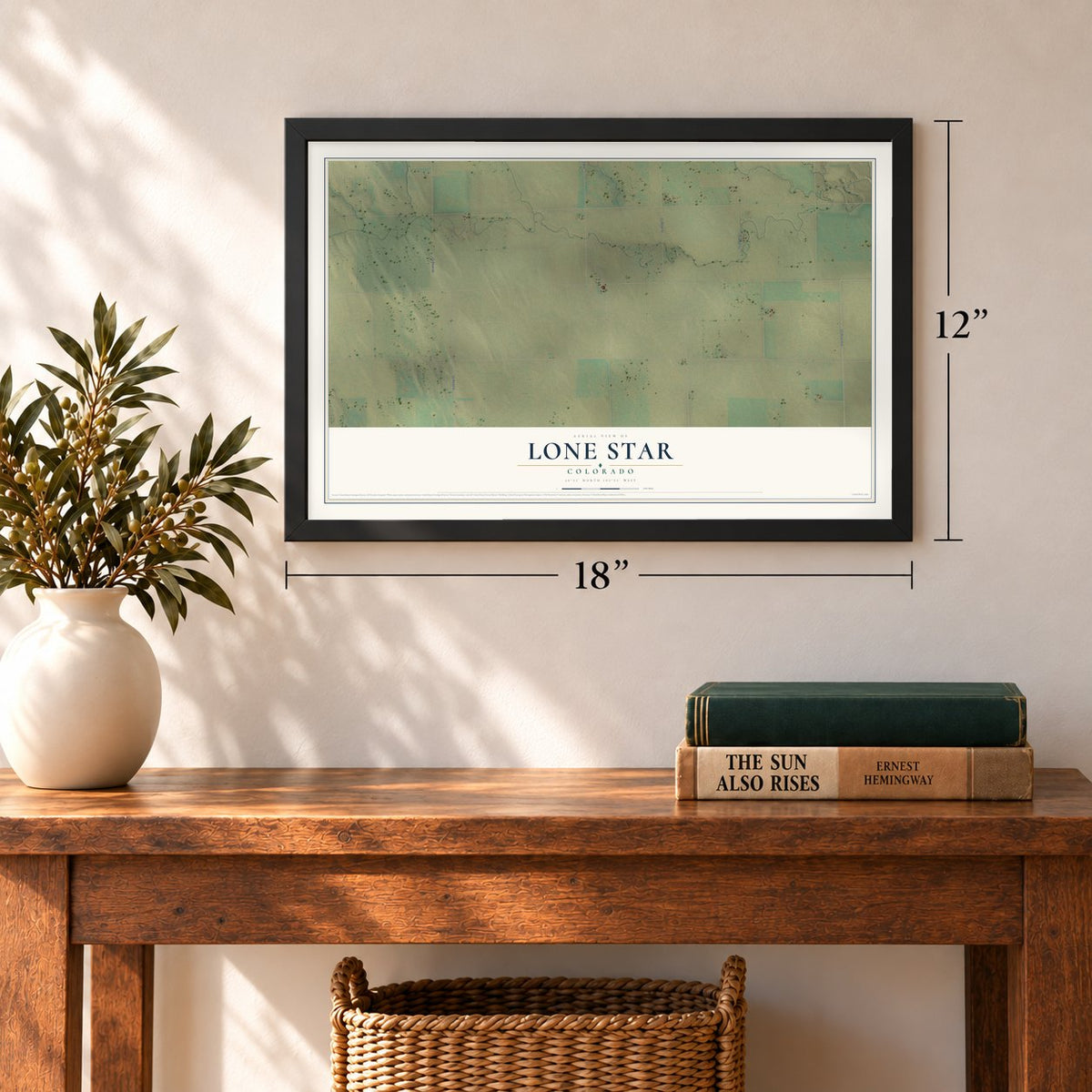 Lone Star, Colorado map, 12 x 18 inch print in a black frame in an entryway