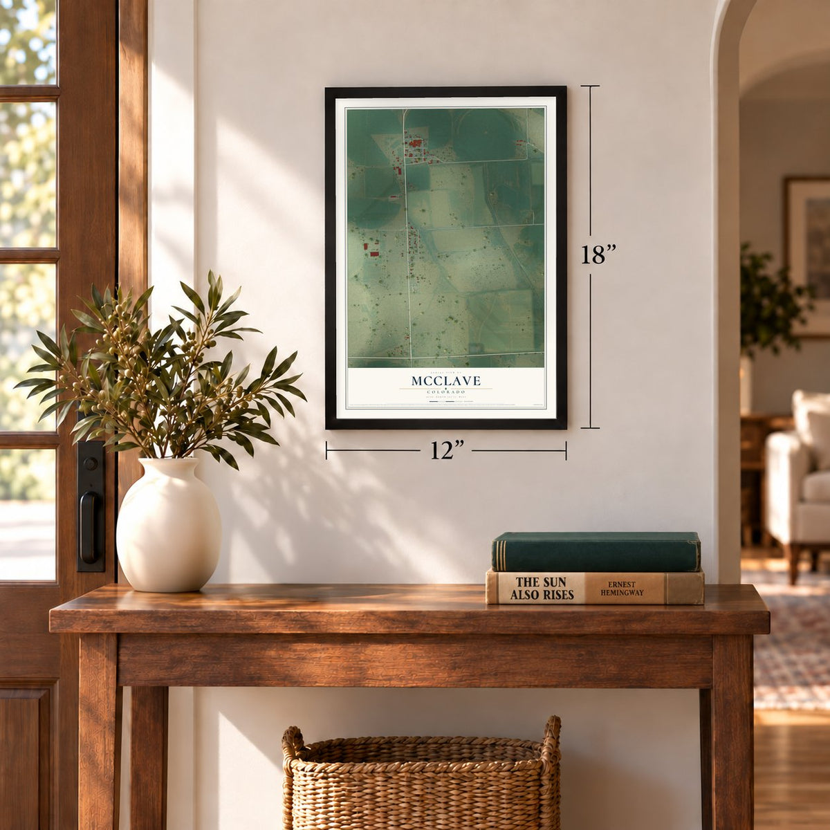 McClave, Colorado map, 12 x 18 inch print in a black frame in an entryway