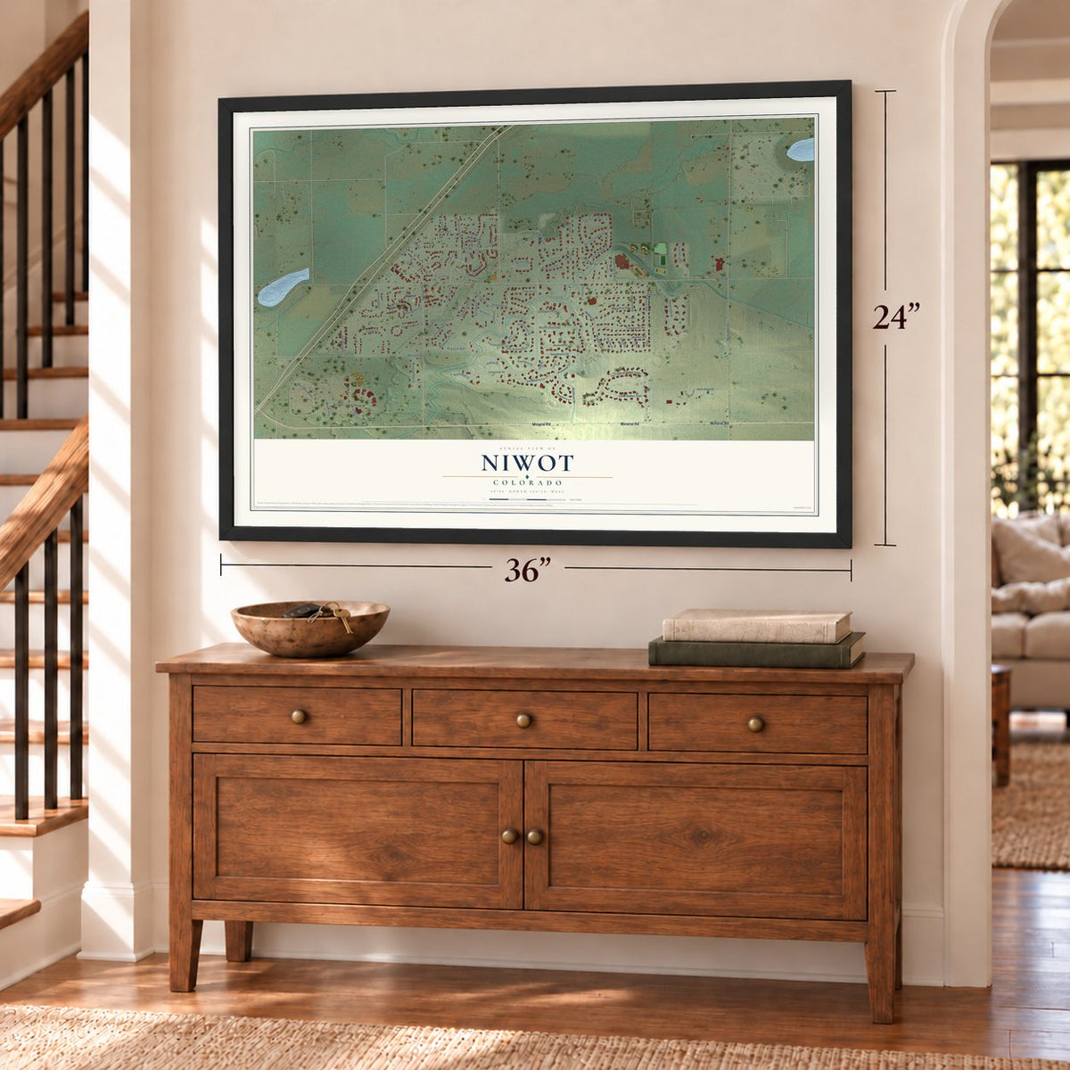 Niwot, Colorado map, 24 x 36 inch print in a black frame above a dresser by a staircase