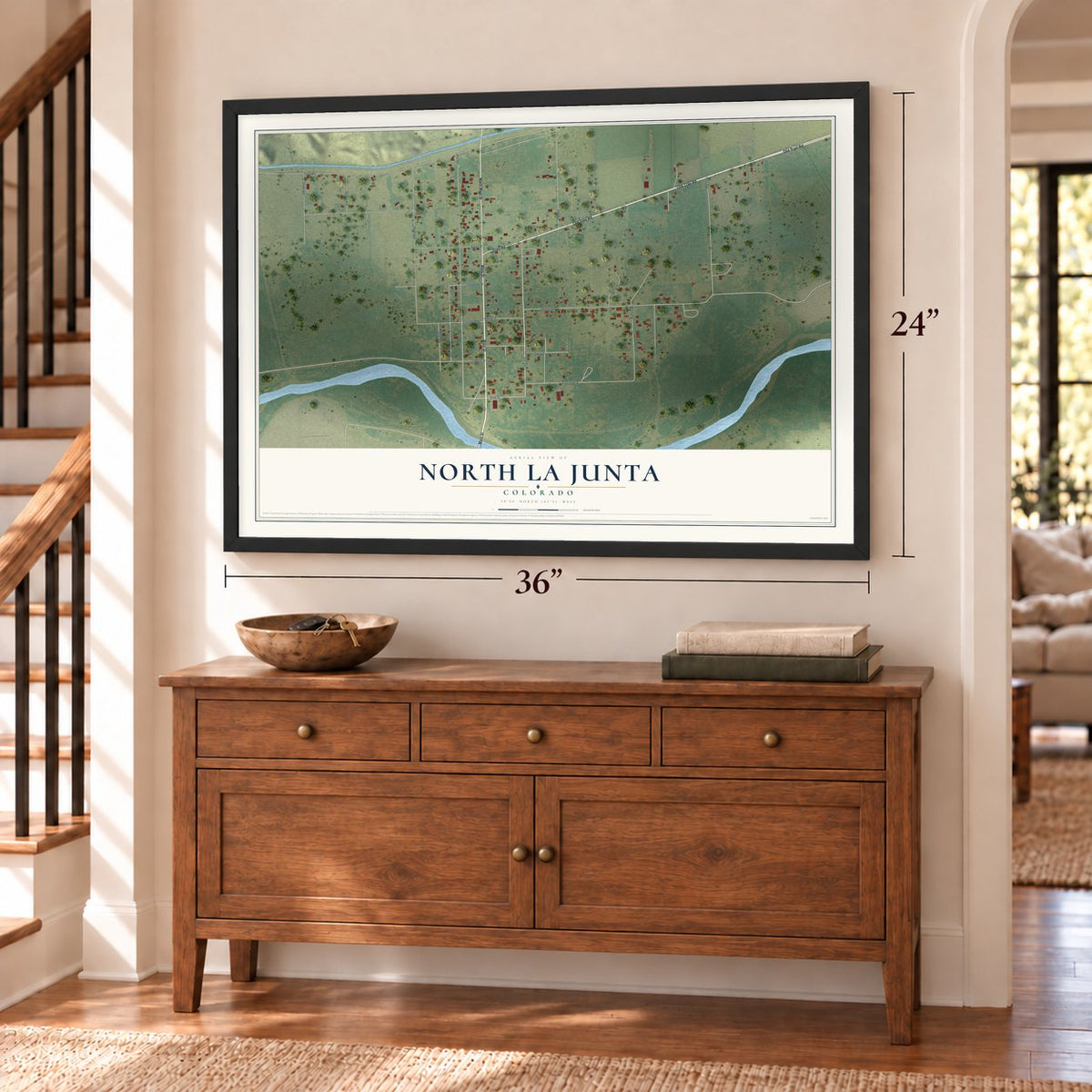 North La Junta, Colorado map, 24 x 36 inch print in a black frame above a dresser by a staircase