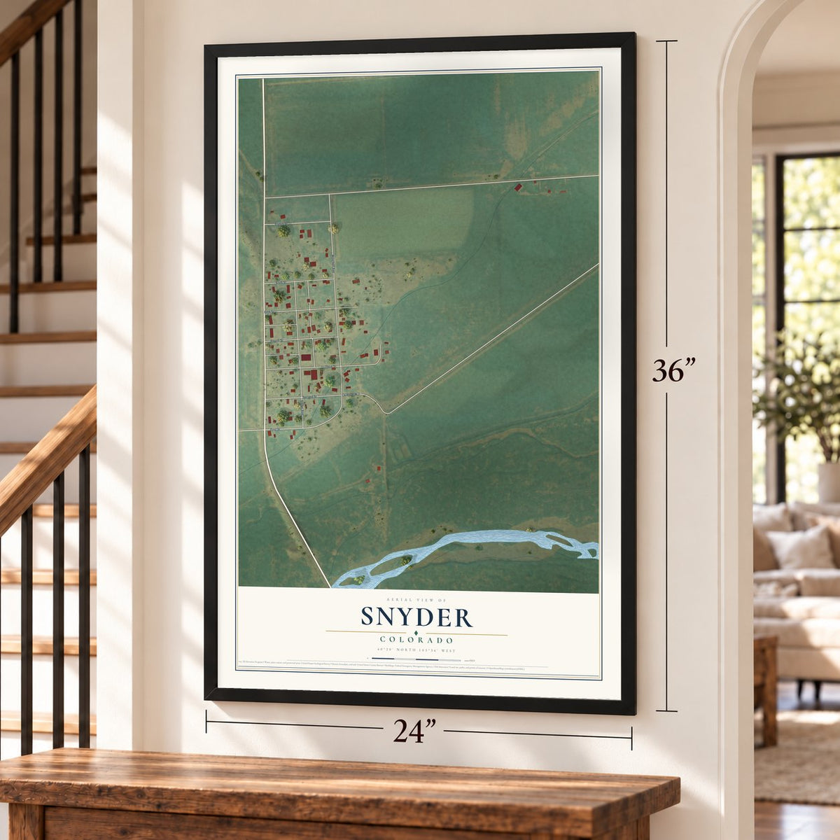 Snyder, Colorado map, 24 x 36 inch print in a black frame by a staircase