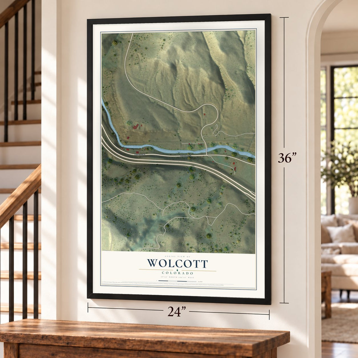 Wolcott, Colorado map, 24 x 36 inch print in a black frame by a staircase