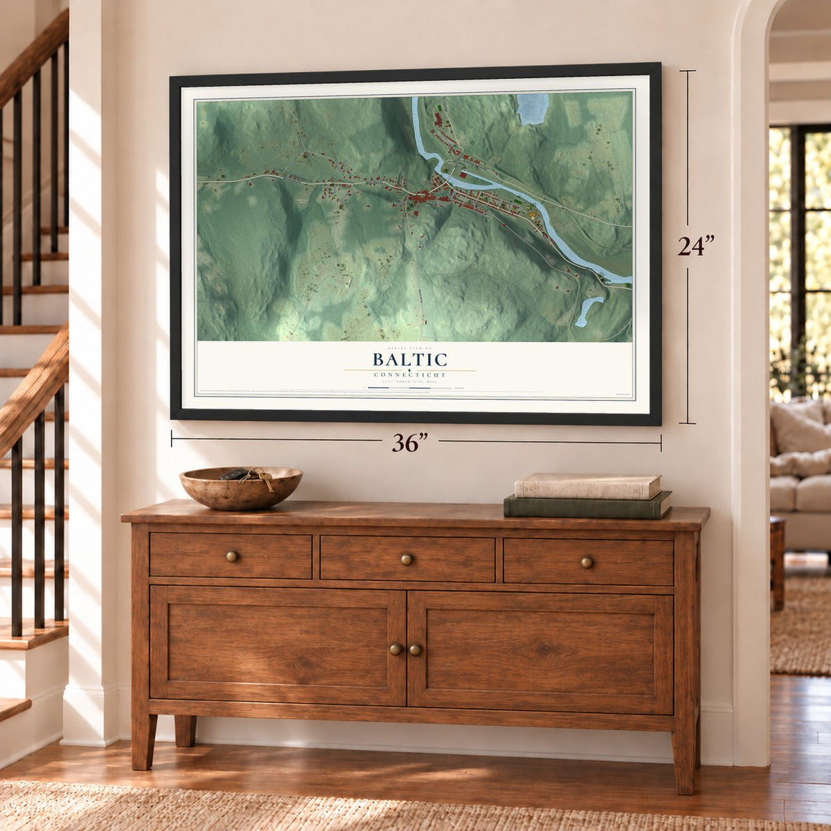 Baltic, Connecticut map, 24 x 36 inch print in a black frame above a dresser by a staircase