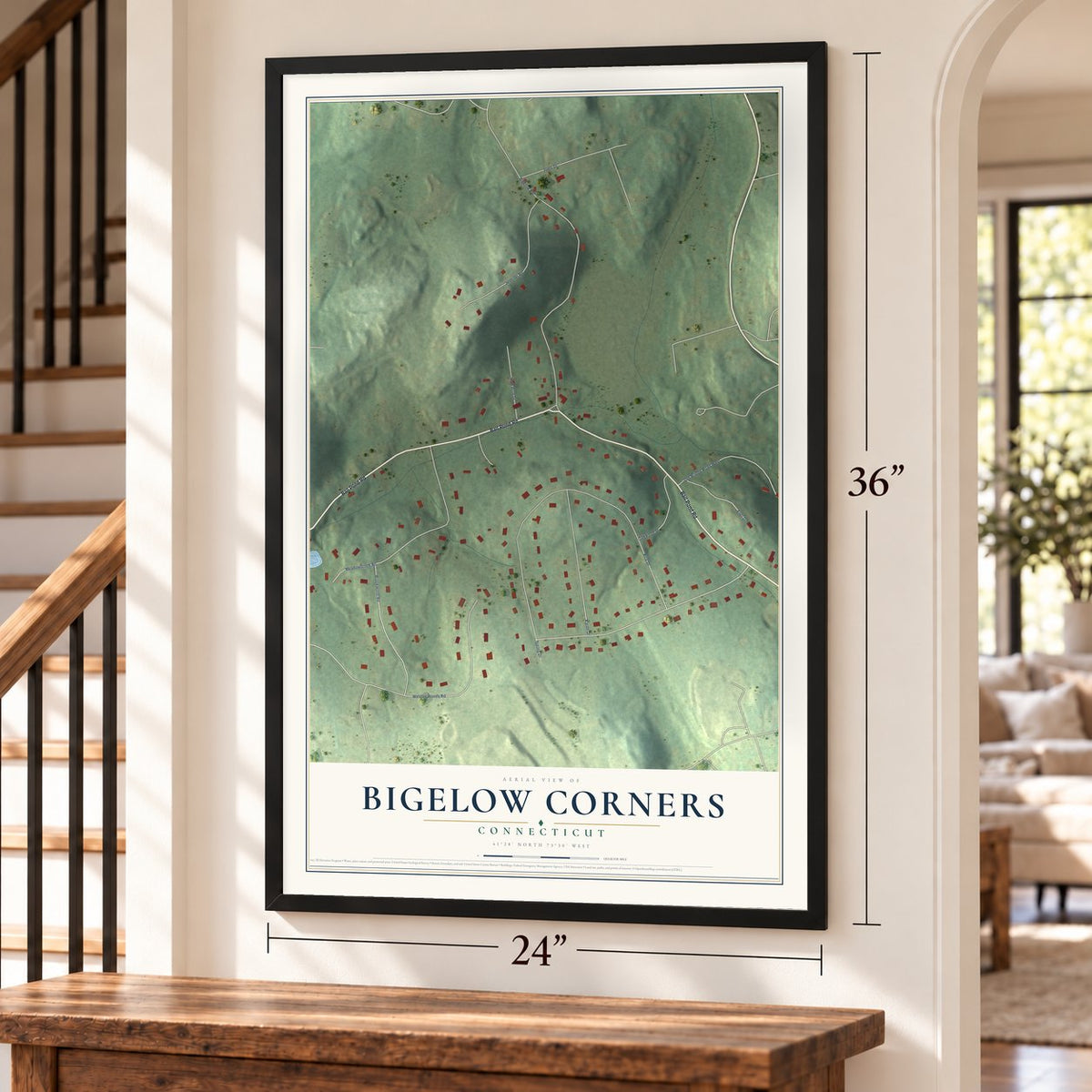 Bigelow Corners, Connecticut map, 24 x 36 inch print in a black frame by a staircase