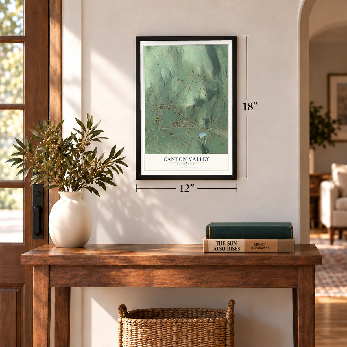 Canton Valley, Connecticut map, 12 x 18 inch print in a black frame in an entryway