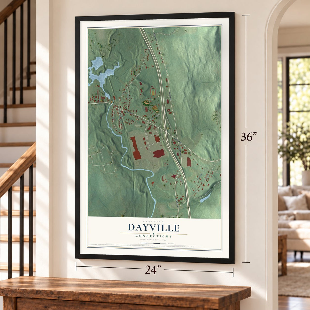 Dayville, Connecticut map, 24 x 36 inch print in a black frame by a staircase