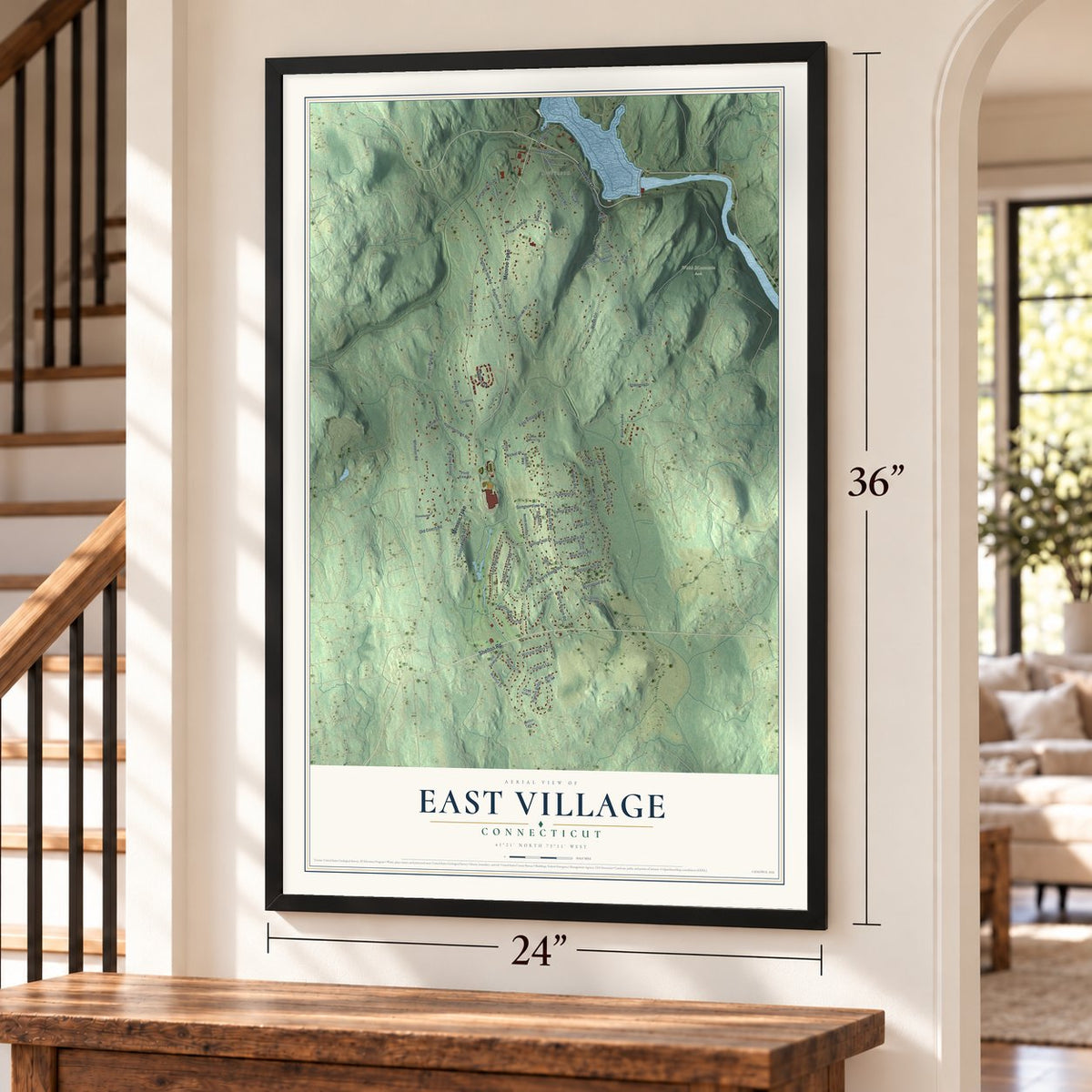 East Village, Connecticut map, 24 x 36 inch print in a black frame by a staircase
