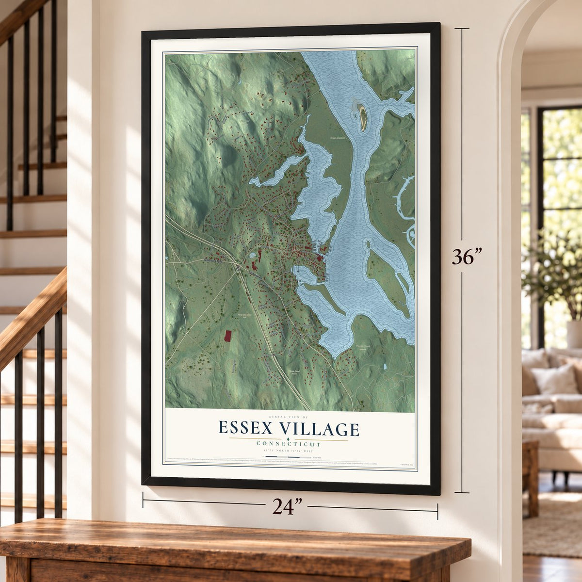 Essex Village, Connecticut map, 24 x 36 inch print in a black frame by a staircase