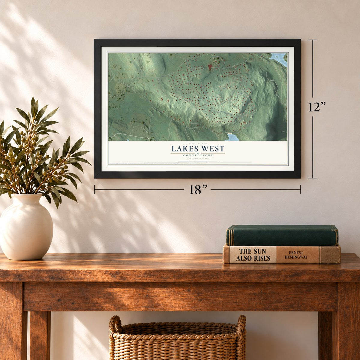 Lakes West, Connecticut map, 12 x 18 inch print in a black frame in an entryway