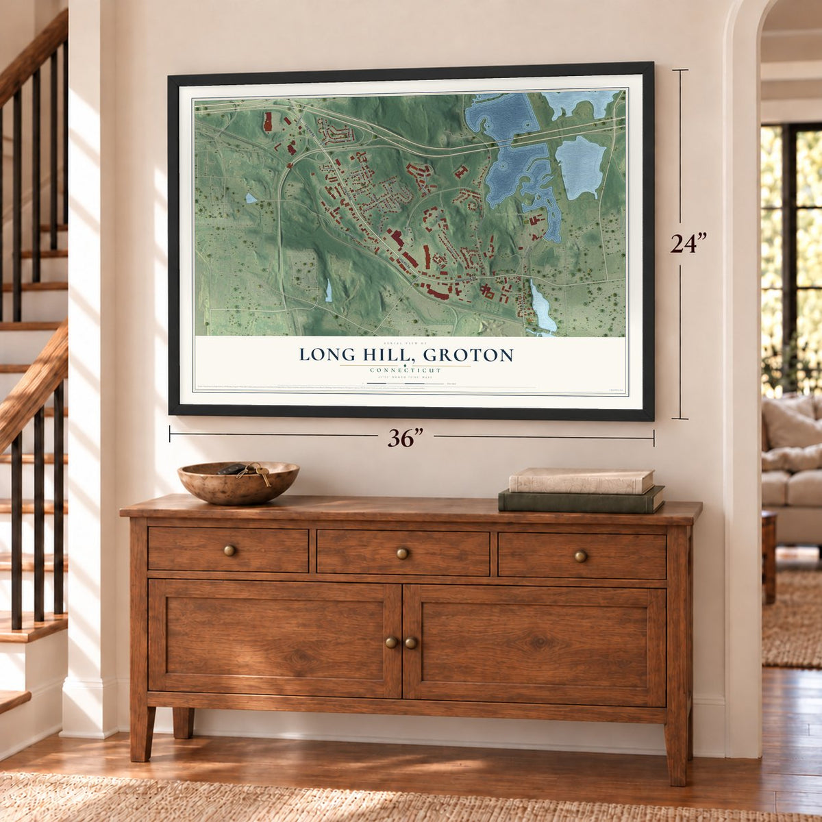 Long Hill, Groton, Connecticut map, 24 x 36 inch print in a black frame above a dresser by a staircase