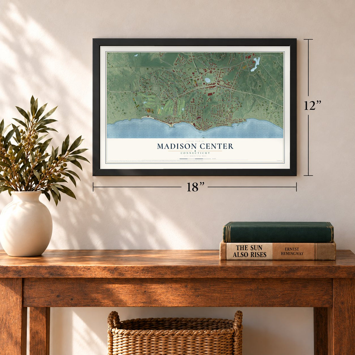 Madison Center, Connecticut map, 12 x 18 inch print in a black frame in an entryway