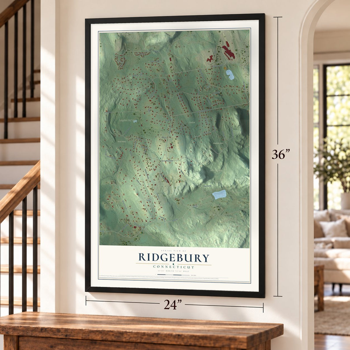 Ridgebury, Connecticut map, 24 x 36 inch print in a black frame by a staircase