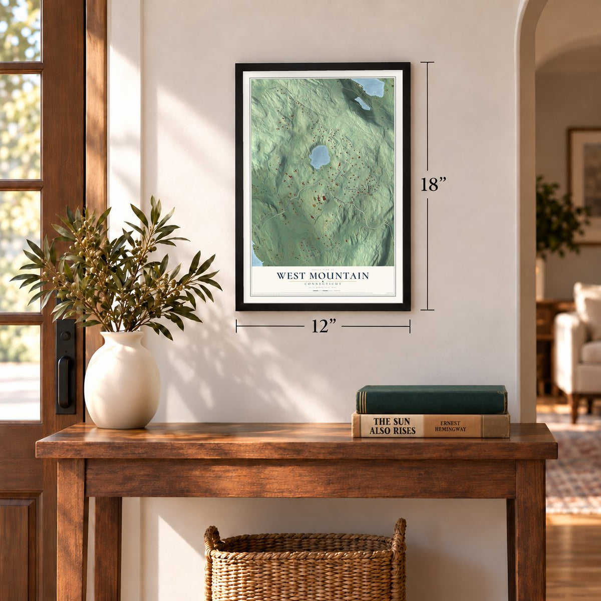 West Mountain, Connecticut map, 12 x 18 inch print in a black frame in an entryway