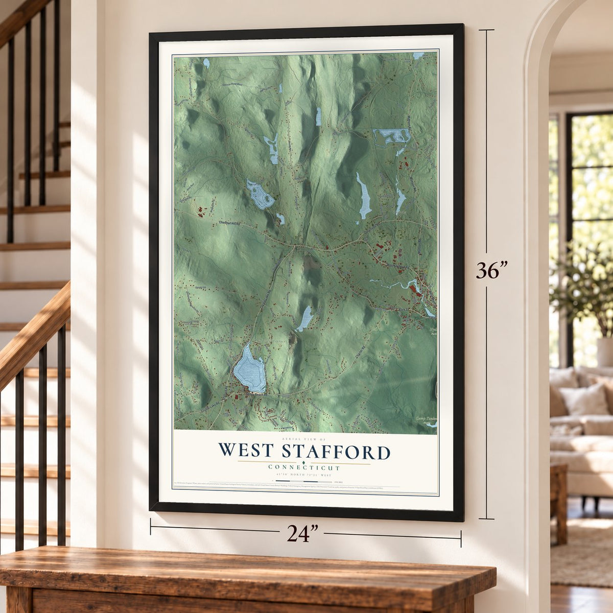 West Stafford, Connecticut map, 24 x 36 inch print in a black frame by a staircase
