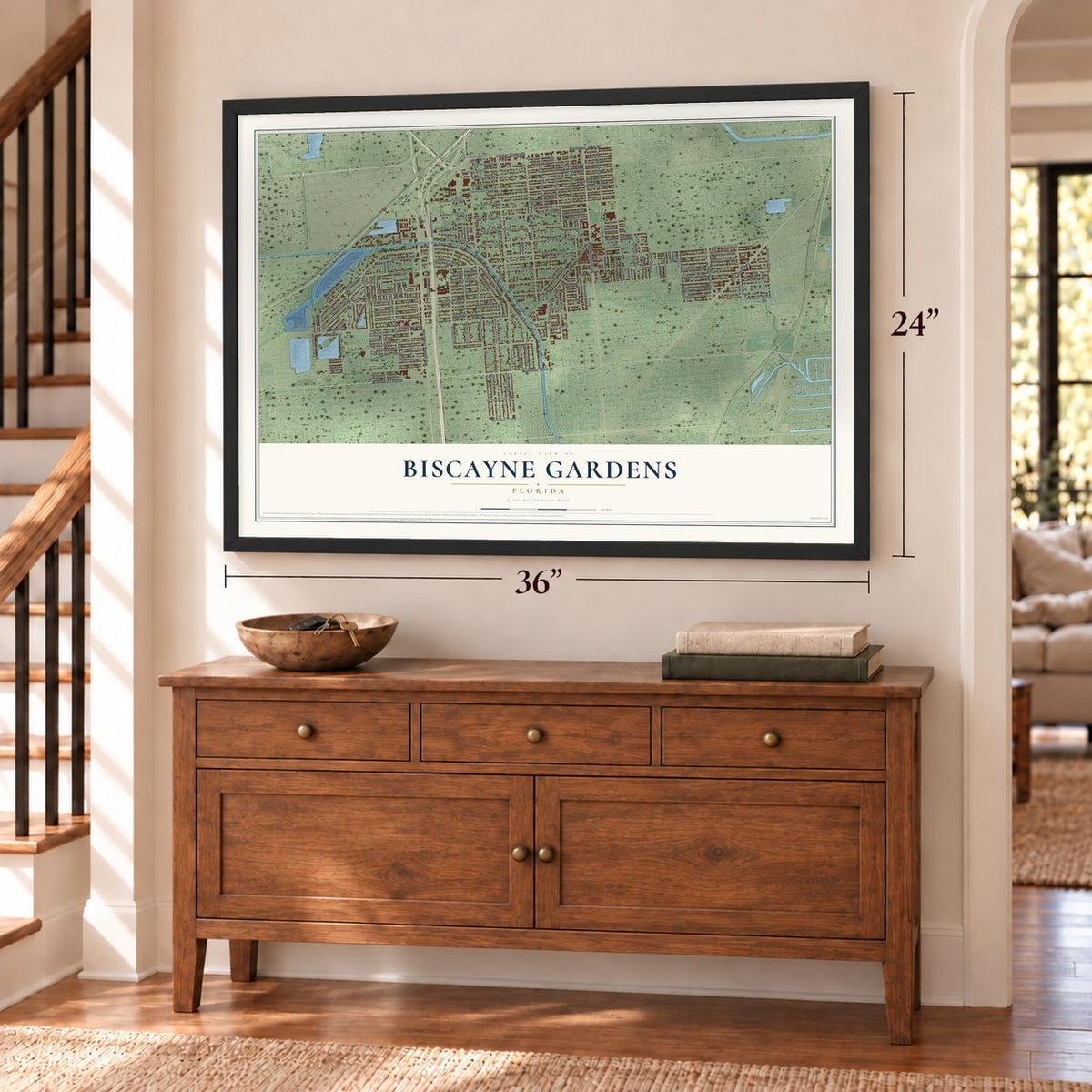 Biscayne Gardens, Florida map, 24 x 36 inch print in a black frame above a dresser by a staircase