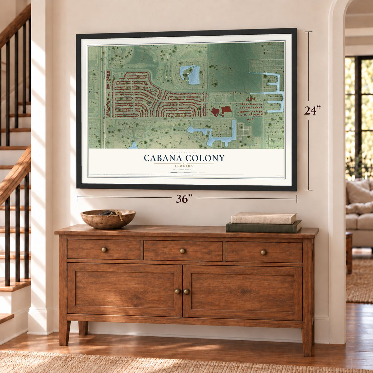 Cabana Colony, Florida map, 24 x 36 inch print in a black frame above a dresser by a staircase