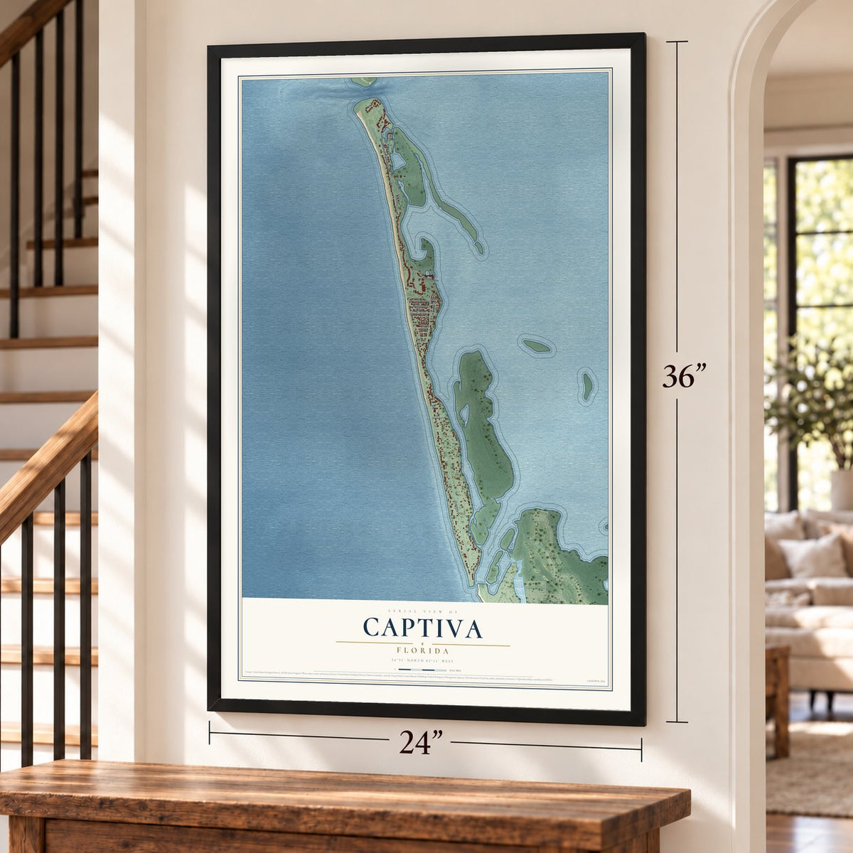 Captiva, Florida map, 24 x 36 inch print in a black frame by a staircase