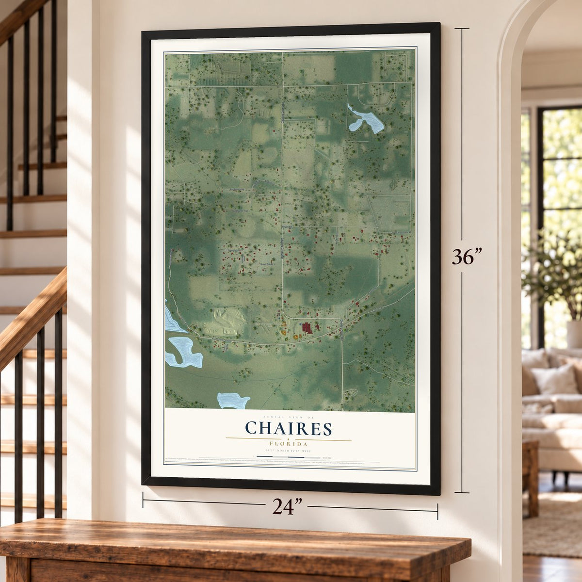 Chaires, Florida map, 24 x 36 inch print in a black frame by a staircase