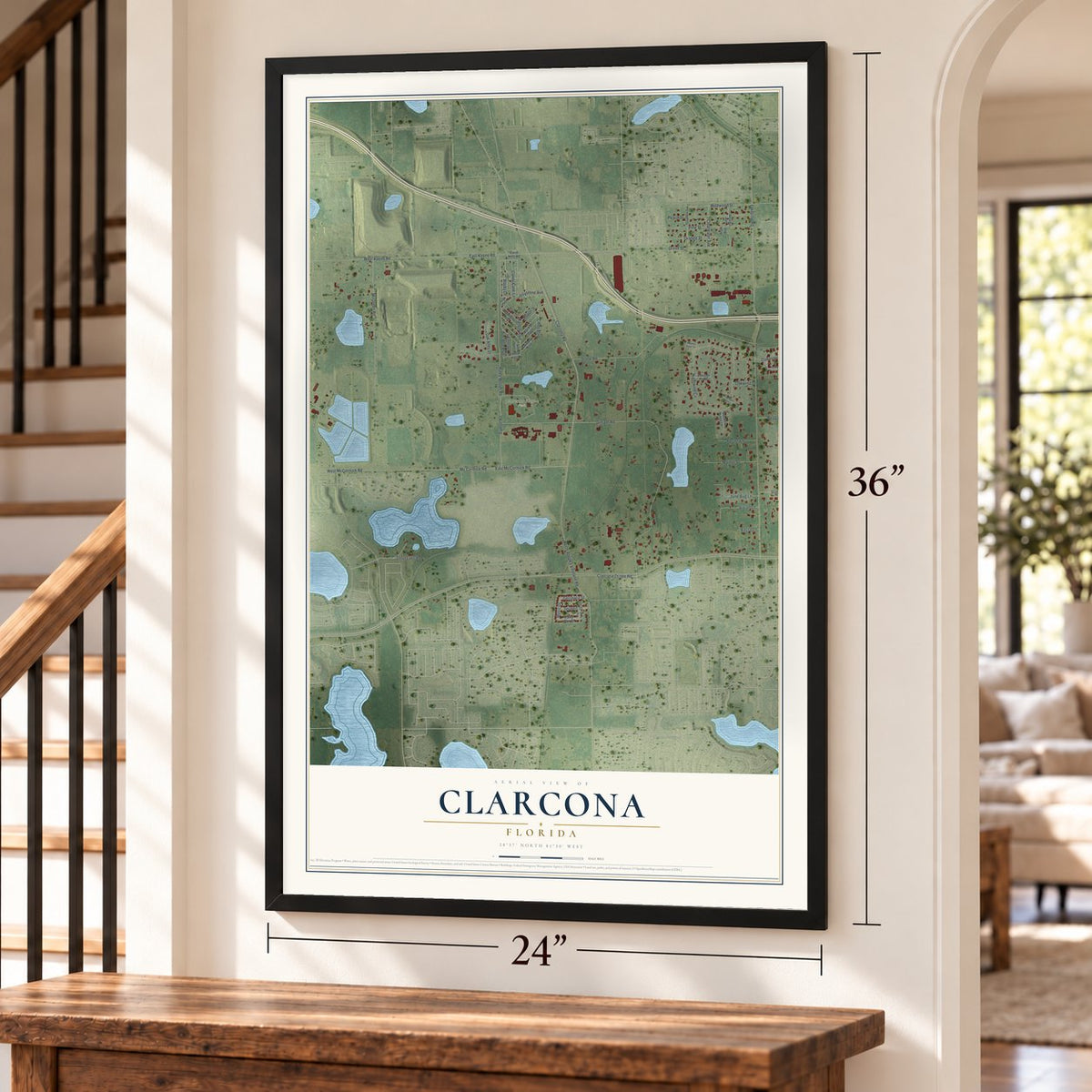 Clarcona, Florida map, 24 x 36 inch print in a black frame by a staircase