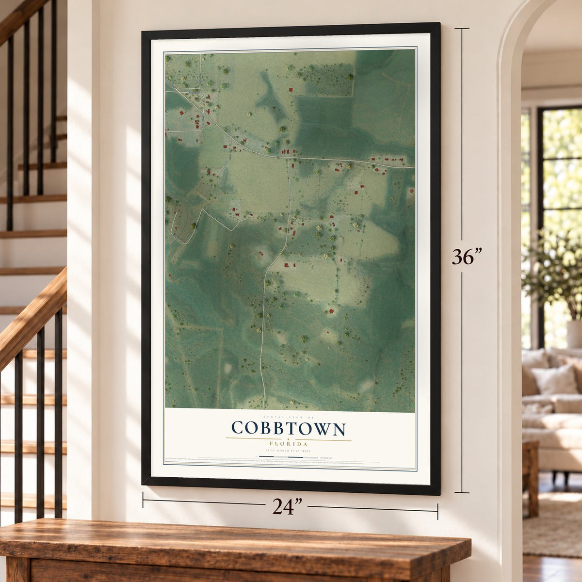 Cobbtown, Florida map, 24 x 36 inch print in a black frame by a staircase