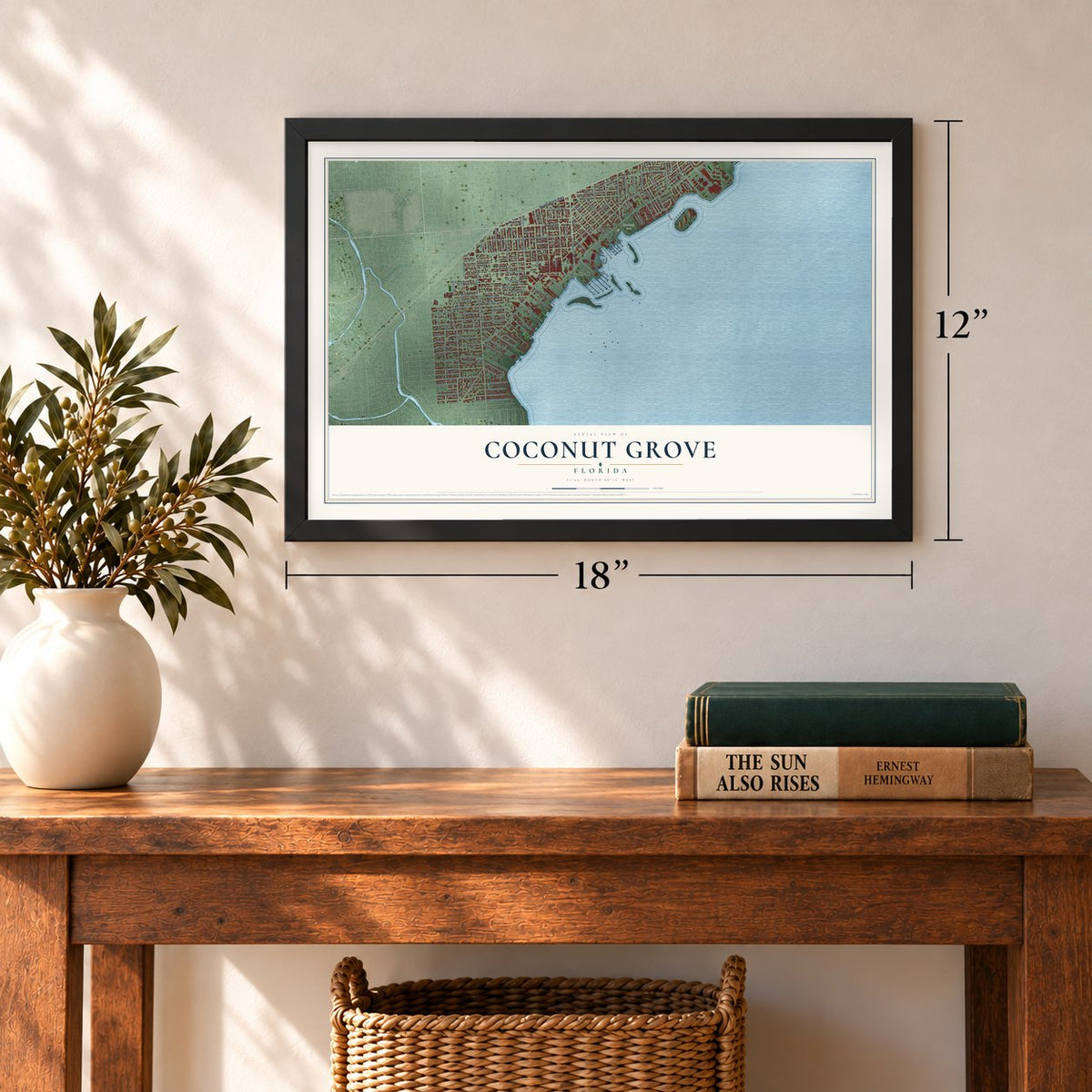 Coconut Grove, Florida map, 12 x 18 inch print in a black frame in an entryway