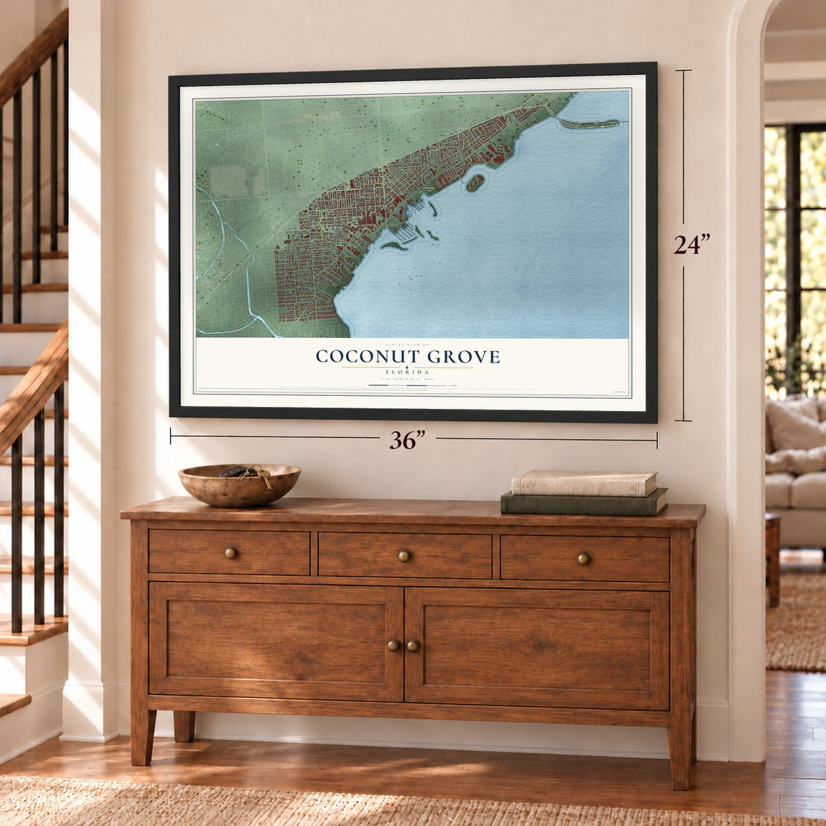 Coconut Grove, Florida map, 24 x 36 inch print in a black frame above a dresser by a staircase
