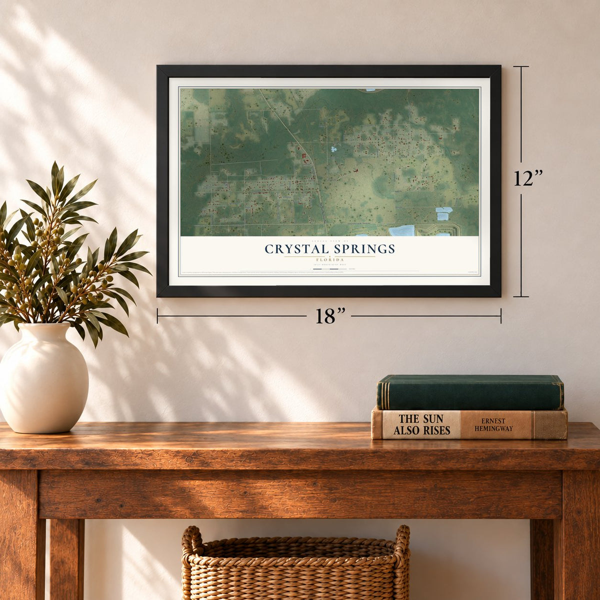 Crystal Springs, Florida map, 12 x 18 inch print in a black frame in an entryway