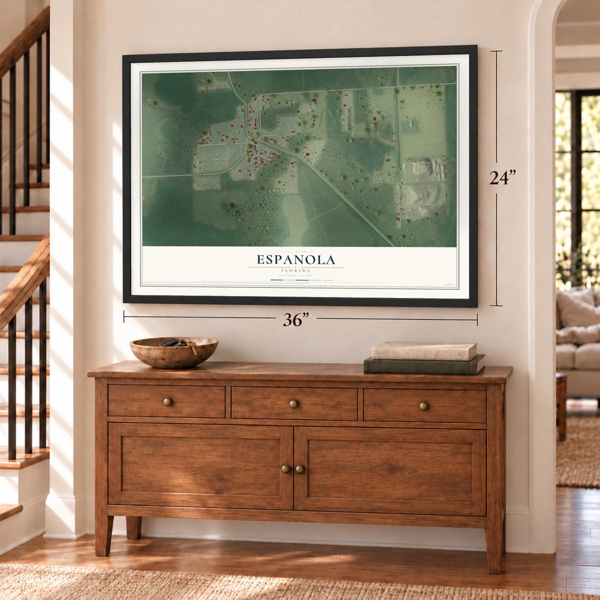 Espanola, Florida map, 24 x 36 inch print in a black frame above a dresser by a staircase