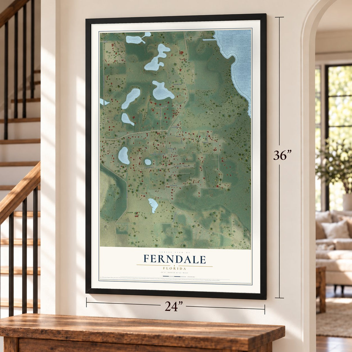 Ferndale, Florida map, 24 x 36 inch print in a black frame by a staircase