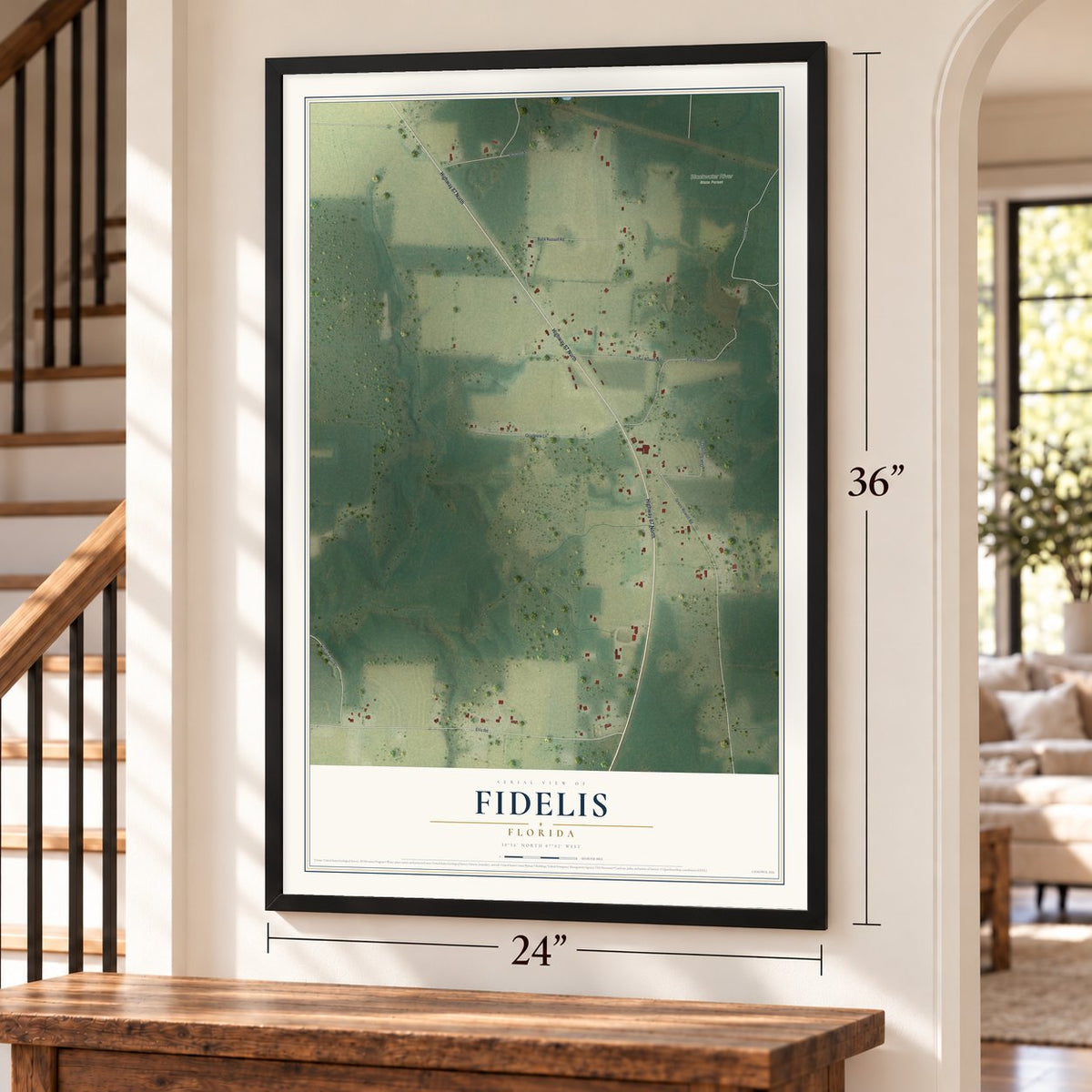 Fidelis, Florida map, 24 x 36 inch print in a black frame by a staircase
