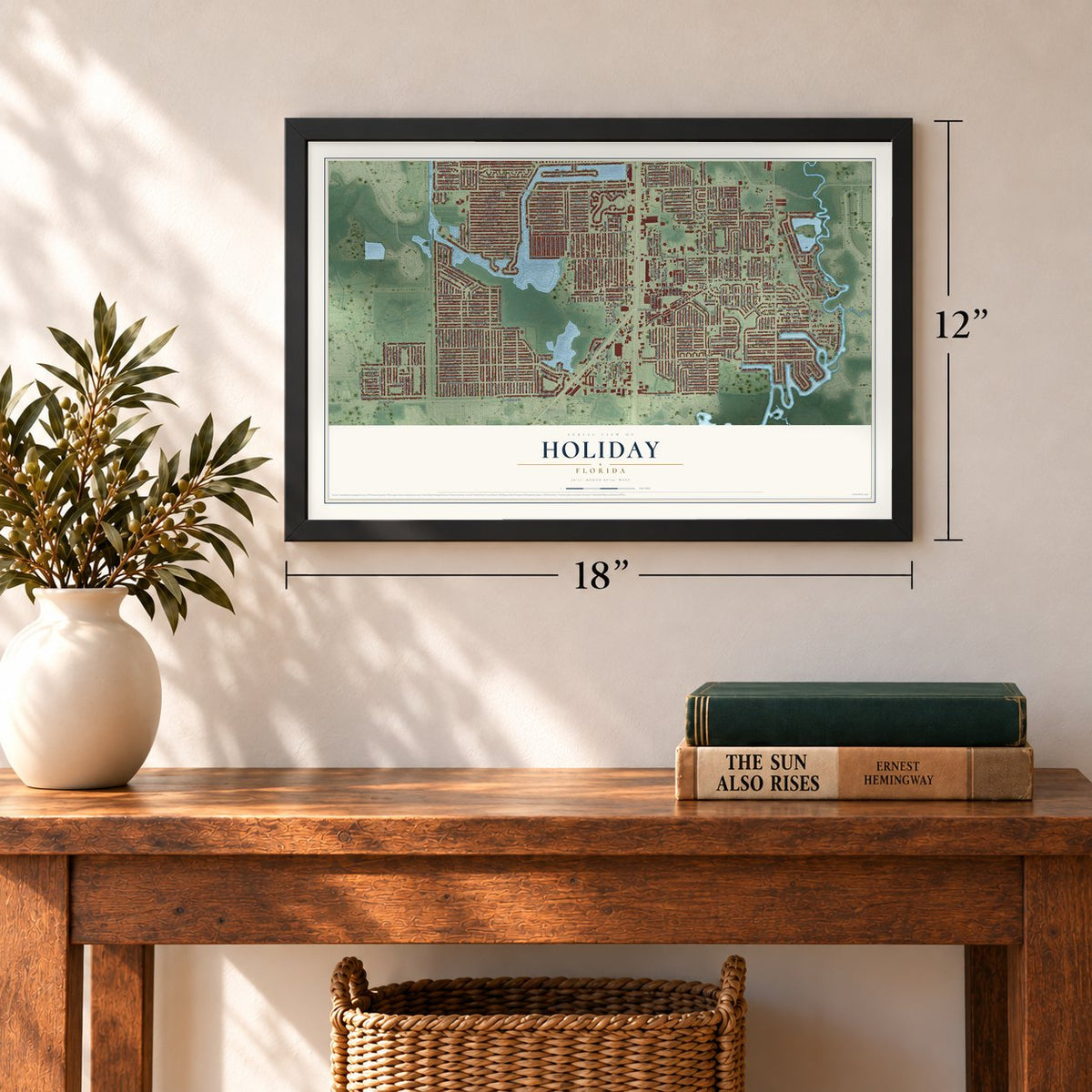 Holiday, Florida map, 12 x 18 inch print in a black frame in an entryway