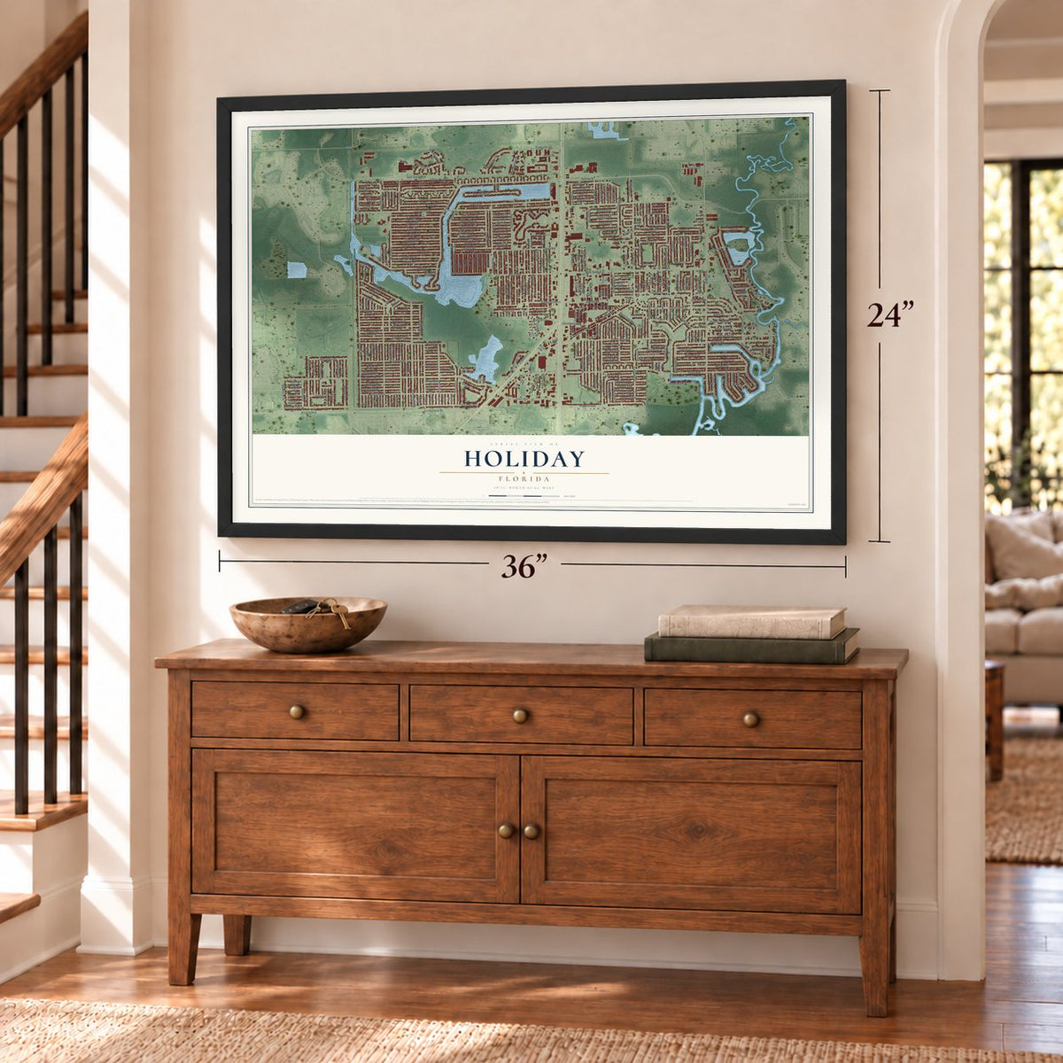Holiday, Florida map, 24 x 36 inch print in a black frame above a dresser by a staircase
