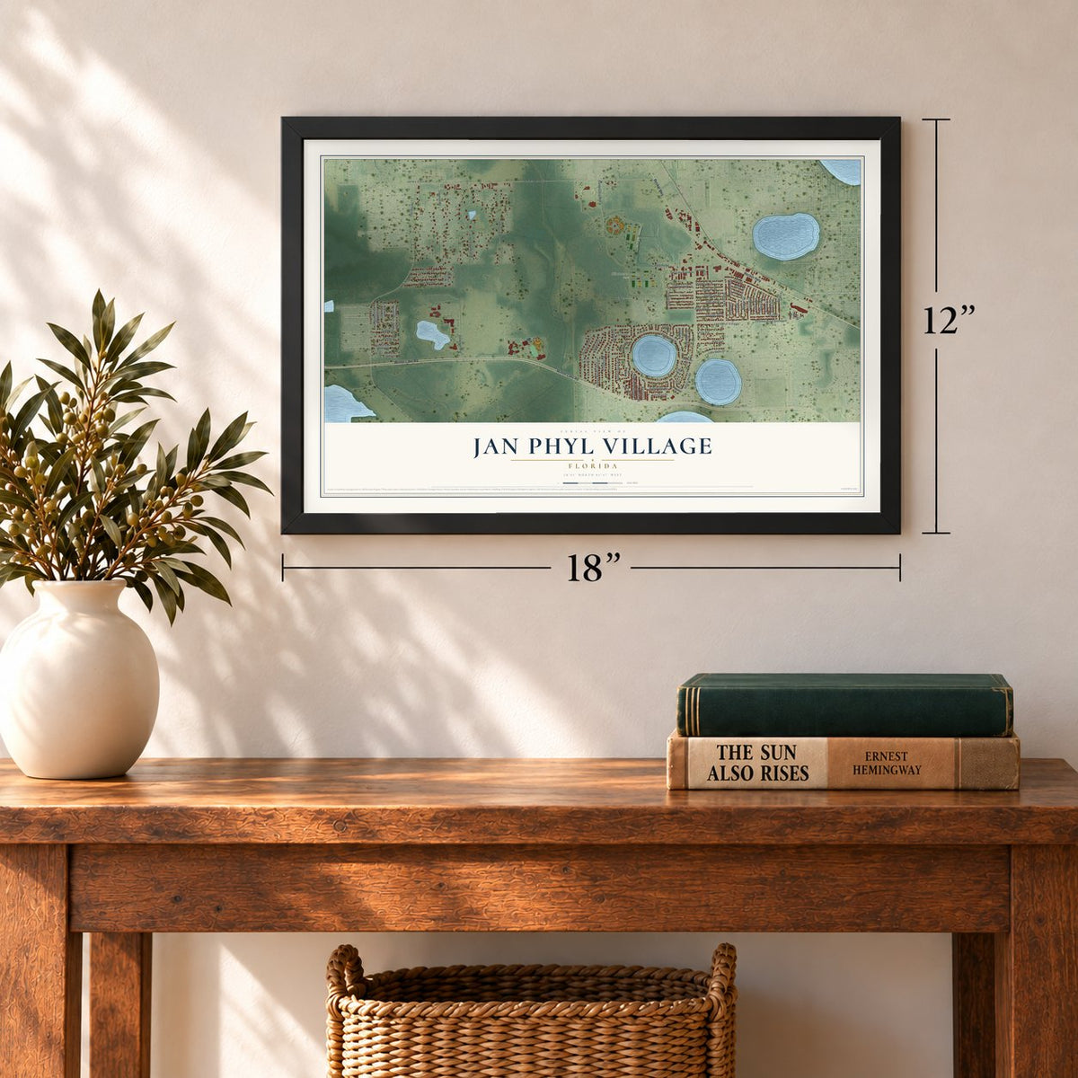 Jan Phyl Village, Florida map, 12 x 18 inch print in a black frame in an entryway