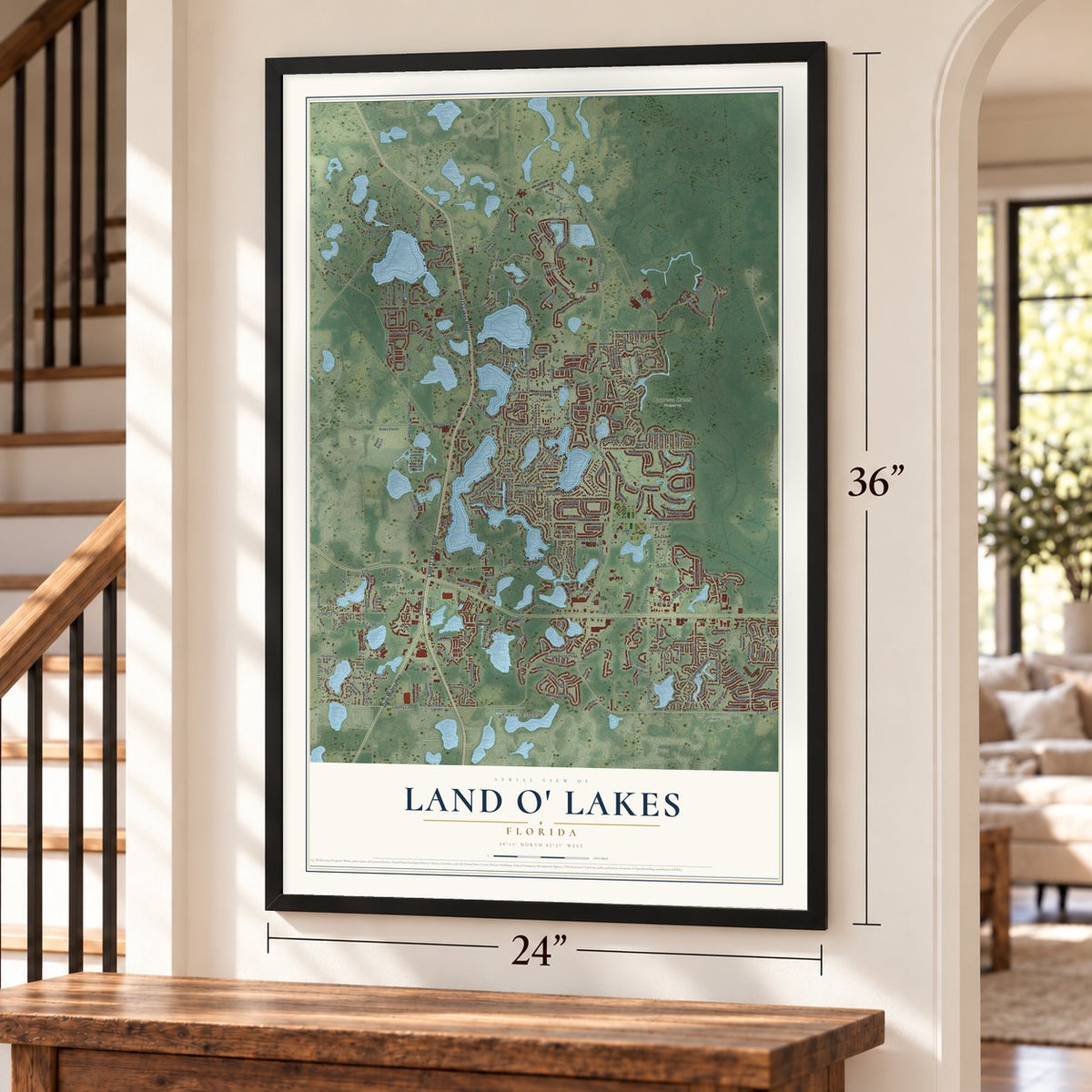 Land O' Lakes, Florida map, 24 x 36 inch print in a black frame by a staircase