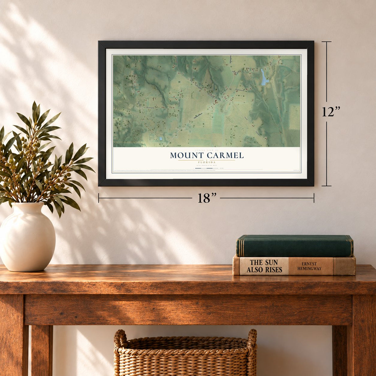 Mount Carmel, Florida map, 12 x 18 inch print in a black frame in an entryway