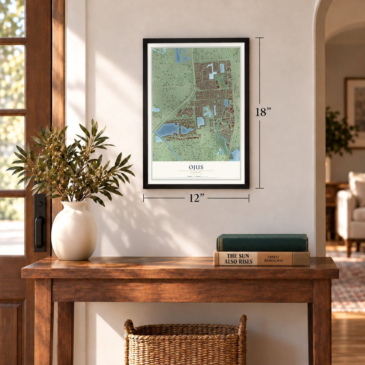 Ojus, Florida map, 12 x 18 inch print in a black frame in an entryway