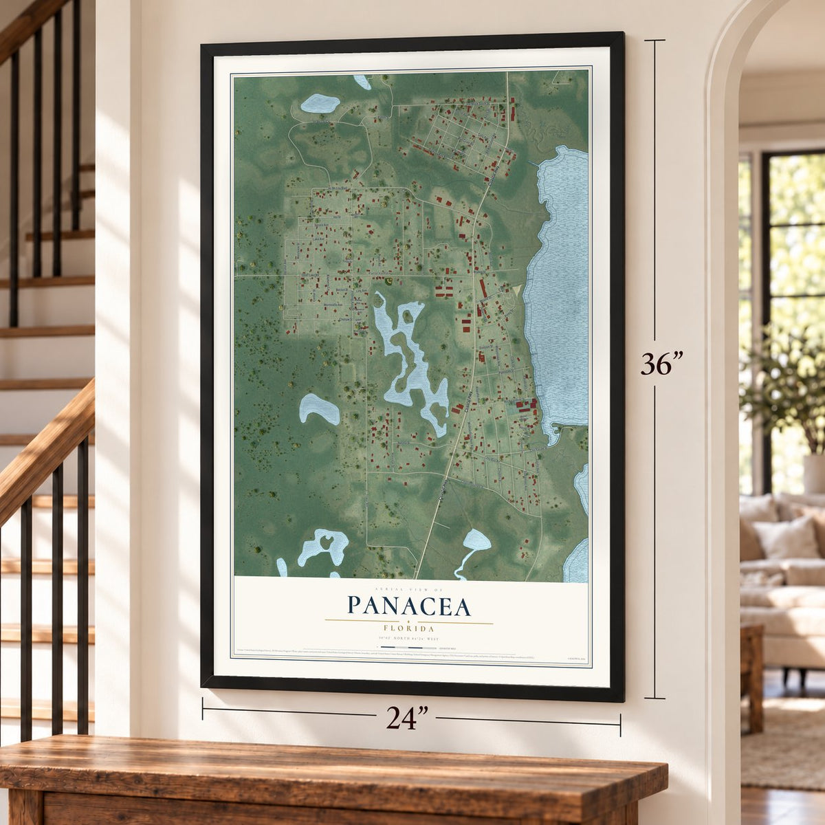 Panacea, Florida map, 24 x 36 inch print in a black frame by a staircase