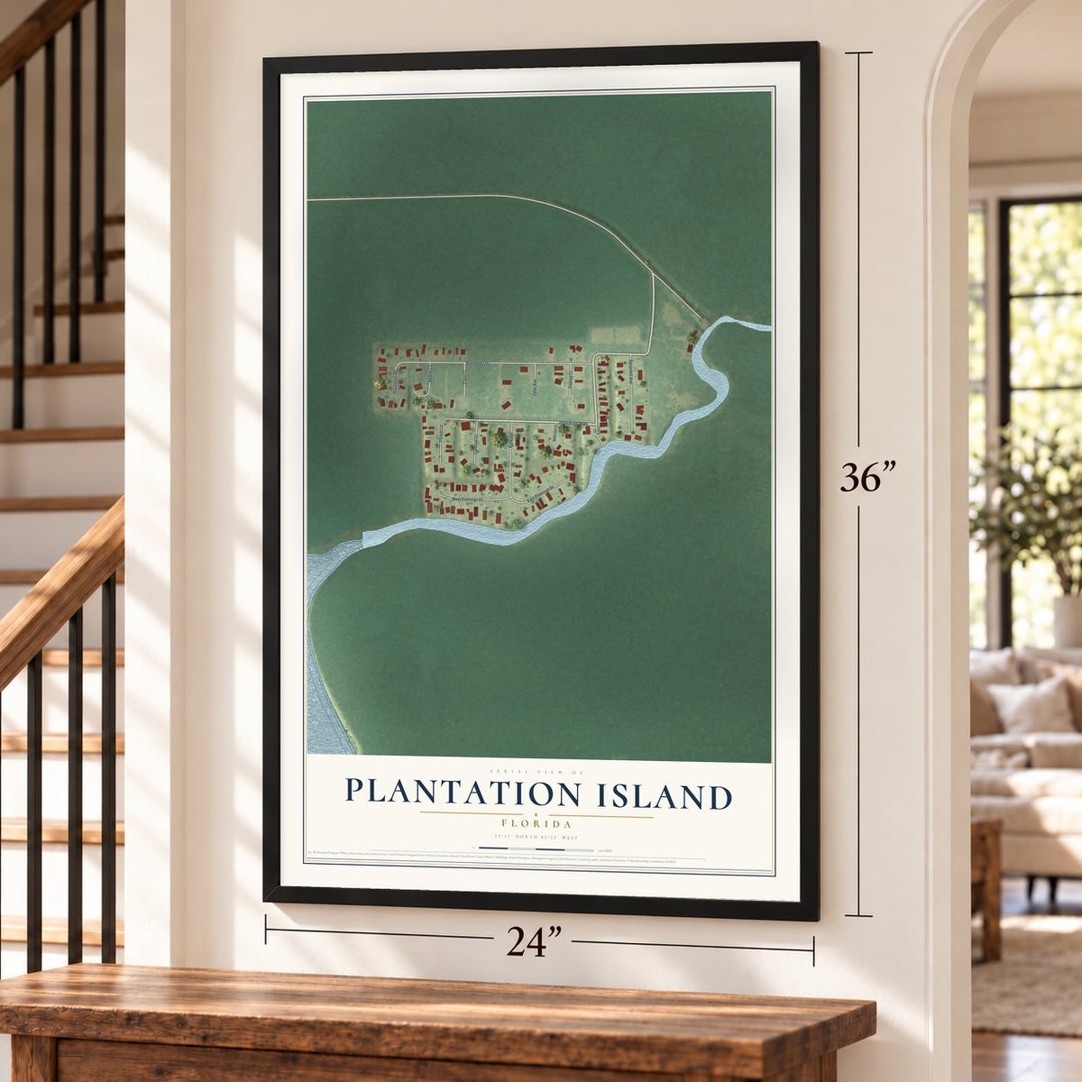 Plantation Island, Florida map, 24 x 36 inch print in a black frame by a staircase