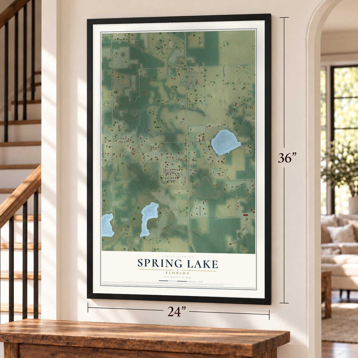 Spring Lake, Florida map, 24 x 36 inch print in a black frame by a staircase