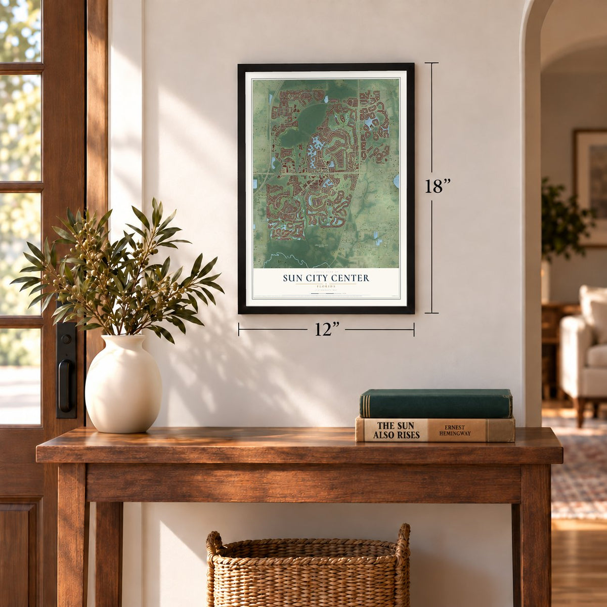 Sun City Center, Florida map, 12 x 18 inch print in a black frame in an entryway